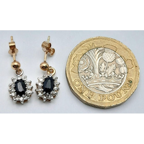 569 - A PAIR OF 9K YELLOW GOLD DIAMOND & SAPPHIRE DROP EARRINGS. 1.83G TOTAL WEIGHT. APPROX. 1.5CM IN LENG... 