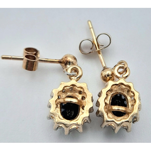 569 - A PAIR OF 9K YELLOW GOLD DIAMOND & SAPPHIRE DROP EARRINGS. 1.83G TOTAL WEIGHT. APPROX. 1.5CM IN LENG... 