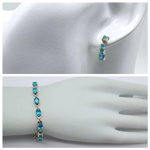 627 - Hallmarked 2012 Sterling Silver Blue Stone Tennis Bracelet and Matching Earrings Set. 19cm Length Br... 