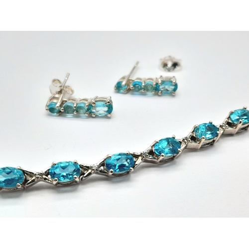 627 - Hallmarked 2012 Sterling Silver Blue Stone Tennis Bracelet and Matching Earrings Set. 19cm Length Br... 