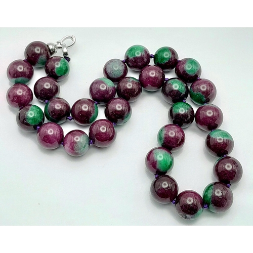 938 - A Large Beaded Ruby Zoisite Necklace. 14mm beads. Necklace length - 42cm.