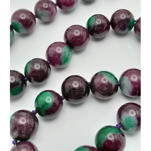 938 - A Large Beaded Ruby Zoisite Necklace. 14mm beads. Necklace length - 42cm.