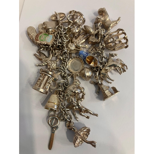 574 - Large selection of Quality Vintage SILVER CHARMS. To include Ballerina, Penny farthing bicycle, Kitt... 