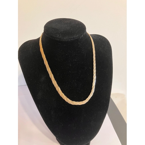 679 - Magnificent 9 CARAT WHITE and YELLOW GOLD NECKLACE. Classic flat woven design. 13.6 grams. 40 cm. Be... 