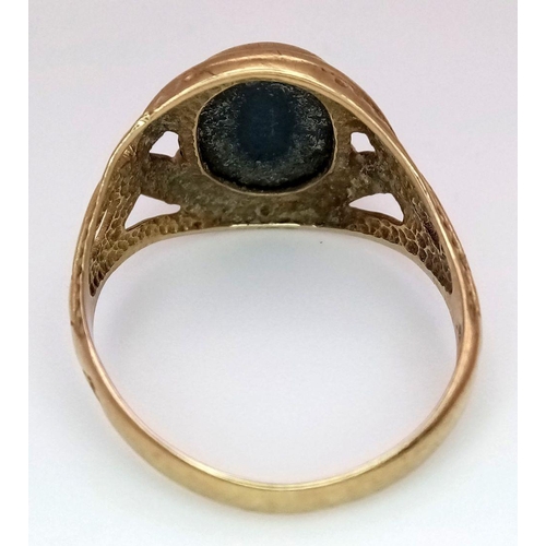 208 - A Vintage 9K Yellow Gold Black Stone Signet Ring. Size S. 3.8g total weight.