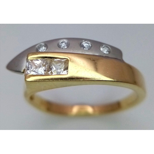 118 - A 14K Yellow Gold White Stone Set Crossover Ring. Size N 1/2. 3.3g total weight.