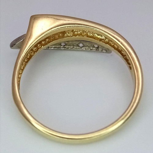 118 - A 14K Yellow Gold White Stone Set Crossover Ring. Size N 1/2. 3.3g total weight.