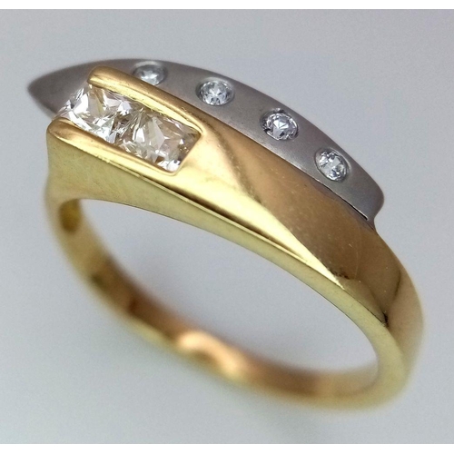 118 - A 14K Yellow Gold White Stone Set Crossover Ring. Size N 1/2. 3.3g total weight.