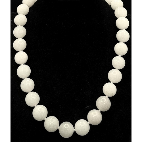 1088 - A White Jade Large Bead Necklace. 14mm beads. 42cm necklace length.