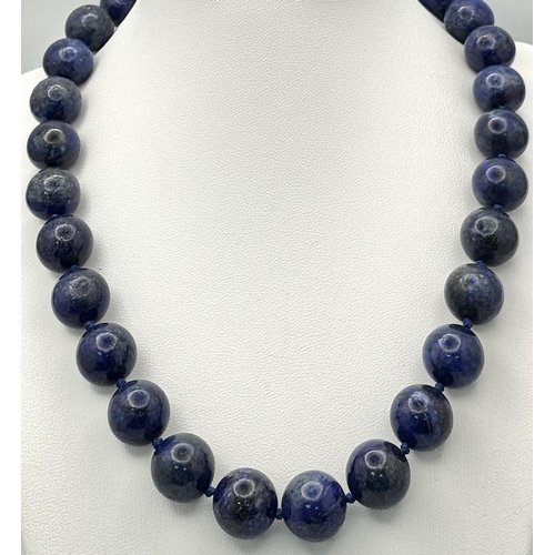 1176 - A Lapis Lazuli Bead Necklace. 14mm beads. 42cm necklace length