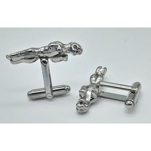 244 - A quality pair of JAGUAR cufflinks in a jeweller’s presentation box. Jaguar length: 30 mm.