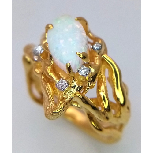 278 - A sterling silver and 18 K yellow gold-filled ring with a naturalistic design and a mesmerising opal... 