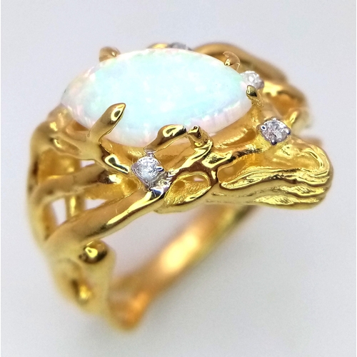 278 - A sterling silver and 18 K yellow gold-filled ring with a naturalistic design and a mesmerising opal... 