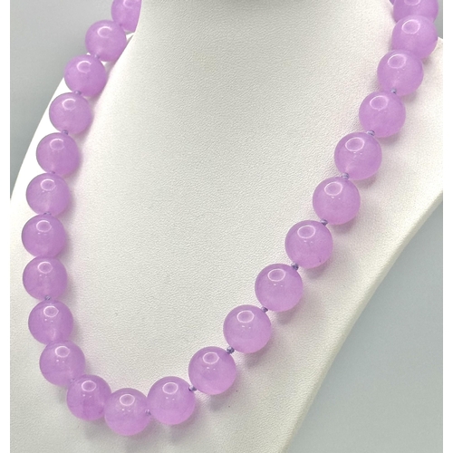 528 - A Large Beaded Lavender Jade Necklace. 14mm beads. 42cm necklace length.