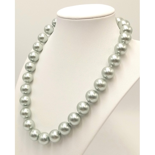 535 - A Metallic Grey South Sea Pearl Shell Large Bead Necklace. 14mm beads. 42cm necklace length.