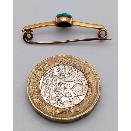 82 - An Antique 18K Gold and Turquoise Small Bar Brooch. 3cm. 0.85g total weight.