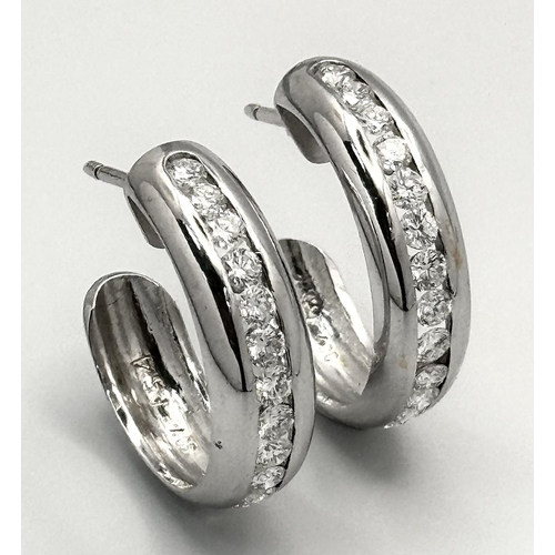 1304 - A PAIR OF 18K WHITE GOLD DIAMOND SET 1/2 HOOP EARRINGS. 1.54CTW, 8.9G, 2.2CM DIAMETER. NEED BUTTERFL... 