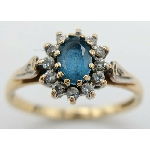 168 - Classic 9 CARAT GOLD and BLUE IOLITE RING. Having an Oval IOLITE mounted to top with Sparkling Clear... 