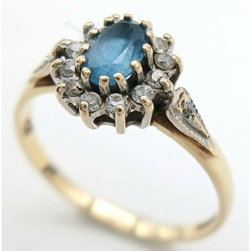 168 - Classic 9 CARAT GOLD and BLUE IOLITE RING. Having an Oval IOLITE mounted to top with Sparkling Clear... 