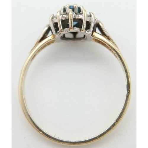 168 - Classic 9 CARAT GOLD and BLUE IOLITE RING. Having an Oval IOLITE mounted to top with Sparkling Clear... 