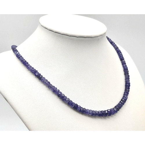 256 - A 85cts Single Strand Graduated Tanzanite Necklace,925 Silver Clasp. 48cm in length, 17.8g total wei... 