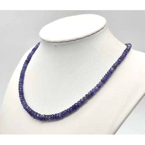 256 - A 85cts Single Strand Graduated Tanzanite Necklace,925 Silver Clasp. 48cm in length, 17.8g total wei... 