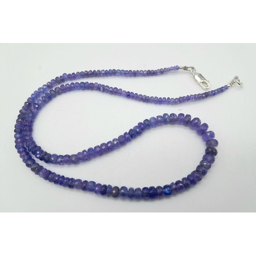 256 - A 85cts Single Strand Graduated Tanzanite Necklace,925 Silver Clasp. 48cm in length, 17.8g total wei... 