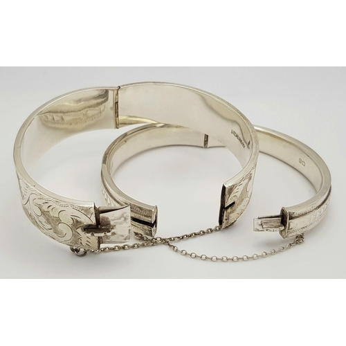 475 - Two Vintage Solid Silver 925 Bangles, Total weight: 45.5 grams, Approx. 6cm diameter, with safety ch... 