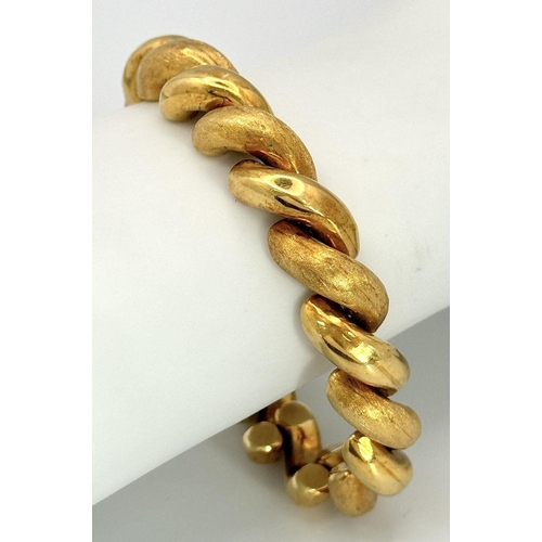 76 - A Gorgeous Designer 18K Yellow Gold Articulated Link Bracelet with Alternating Smooth and Brush Effe... 