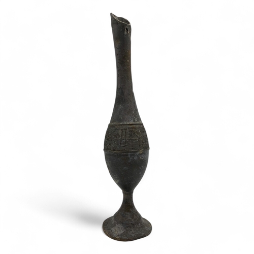 1002 - An antique Oriental Bronze Goblet with Ornamental Relief. 
Hand engraved designs featuring landscape... 