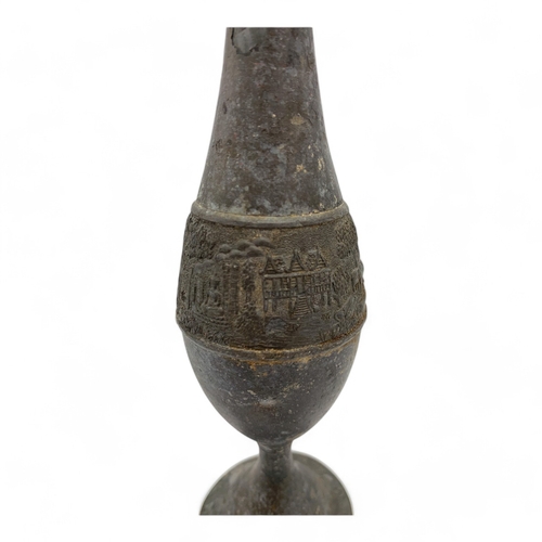 1002 - An antique Oriental Bronze Goblet with Ornamental Relief. 
Hand engraved designs featuring landscape... 