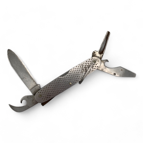 1023 - A Vietnam war era Camillus 1965 U.S. Military Pocket Knife, consists of four foldable tools: a blade... 