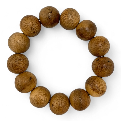 1156 - A Natural Agarwood Bead Bracelet.
The natural agarwood fragrance is well known for its purposes in r... 