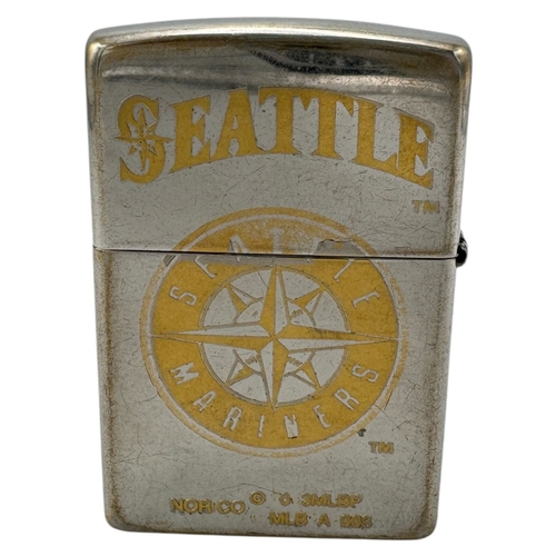 919 - A vintage US Marine Seattle Zippo Lighter. Minor surface scratches and wear consistent with use; no ... 