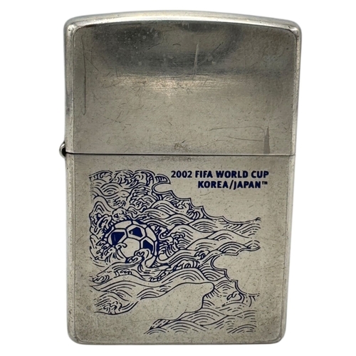 926 - A 2002 FIFA World Cup Korea/Japan Limited Edition Zippo Lighter.
Some signs of wear, including surfa... 