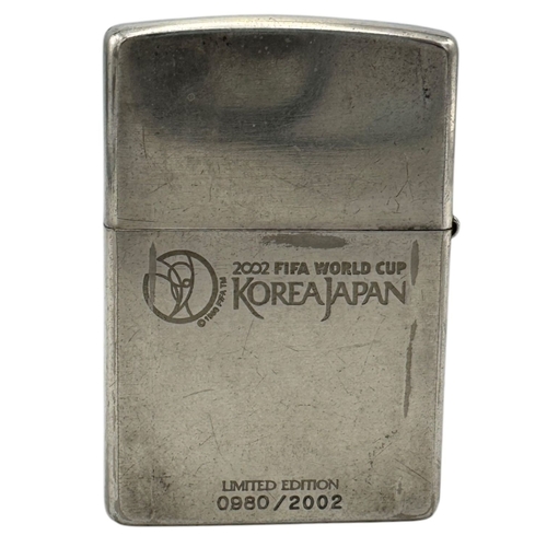 926 - A 2002 FIFA World Cup Korea/Japan Limited Edition Zippo Lighter.
Some signs of wear, including surfa... 