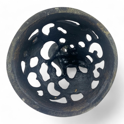 932 - An antique Chinese Bronze Tripod Censer with Pierced Lid. Engraved floral patterns, supported by thr... 