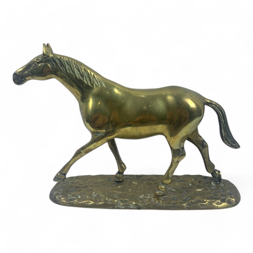 946 - A large Vintage solid bronze Horse Figurine. Polished bronze with a hammered base and detailed craft... 