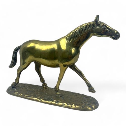 946 - A large Vintage solid bronze Horse Figurine. Polished bronze with a hammered base and detailed craft... 