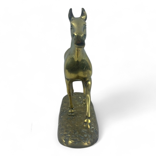 946 - A large Vintage solid bronze Horse Figurine. Polished bronze with a hammered base and detailed craft... 