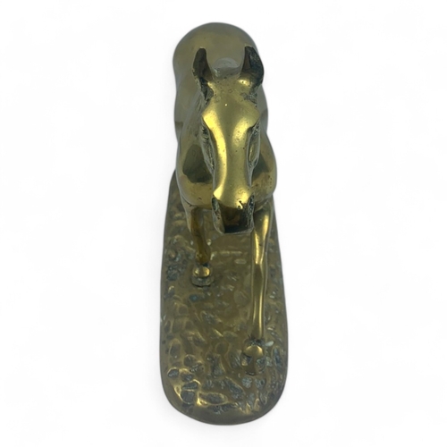 946 - A large Vintage solid bronze Horse Figurine. Polished bronze with a hammered base and detailed craft... 