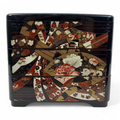 960 - An antique Japanese Lacquered wooden Box Set.
Hand painted lacquerware exterior with intricate flora... 