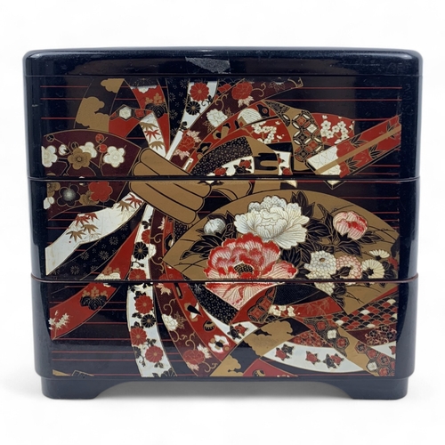 960 - An antique Japanese Lacquered wooden Box Set.
Hand painted lacquerware exterior with intricate flora... 