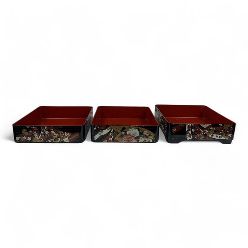 960 - An antique Japanese Lacquered wooden Box Set.
Hand painted lacquerware exterior with intricate flora... 