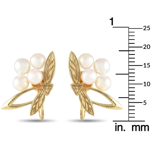 1120 - An Mikimoto 14K Yellow Gold Brooch and Earrings Set. Features a combination of 18K Yellow Gold metal... 