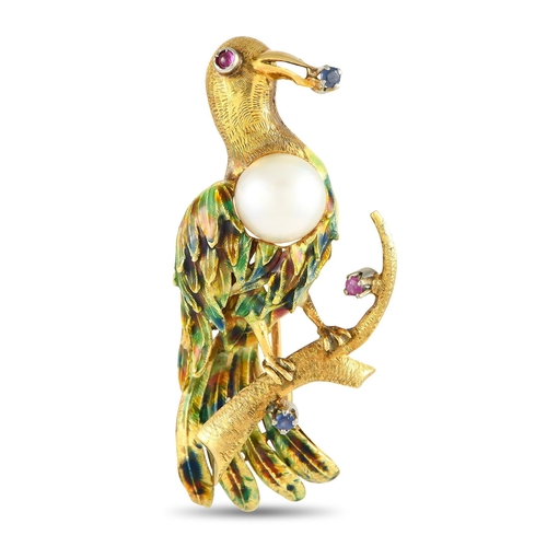 1182 - An 18K Yellow Gold Mother of Pearl, Ruby, Sapphire, and Enamel Bird Brooch. A Mother of Pearl at the... 