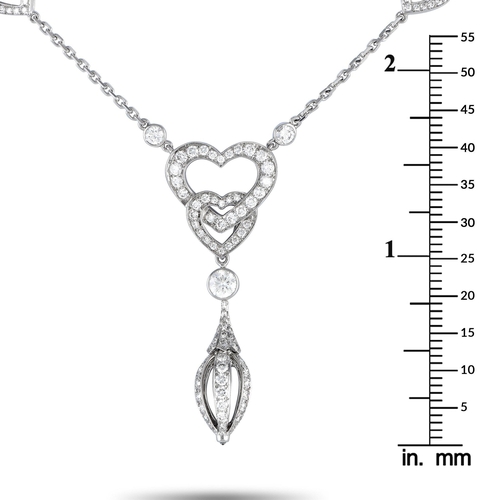 137 - A Cartier 18K White Gold 1.85ct Diamond Heart Necklace. Add charm and sophistication to any ensemble... 