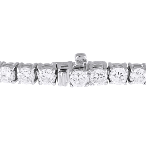 383 - An 18K White Gold 6.86ct Diamond Tennis Bracelet. Diamonds with a total weight of 6.86 carats and 18... 