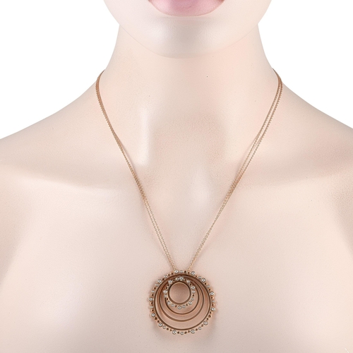 531 - A Bucherer 18K Rose Gold 0.89ct Diamond Circle Necklace. The pendant features multiple rings arrange... 