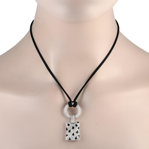 60 - An Cartier Panthere 18K White Gold 2.85ct Diamond and Onyx Pendant Necklace. Total weight of 2.85 ca... 